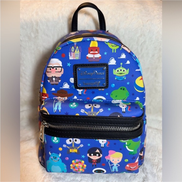 BRAND NEW Disney Parks Pixar Icons Loungefly Backpack - Picture 2 of 9